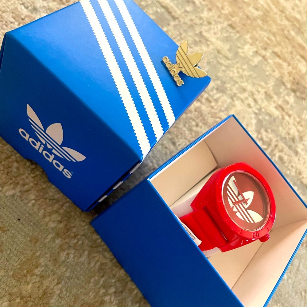 Brand new red adidas watch with box (need battery replaced)